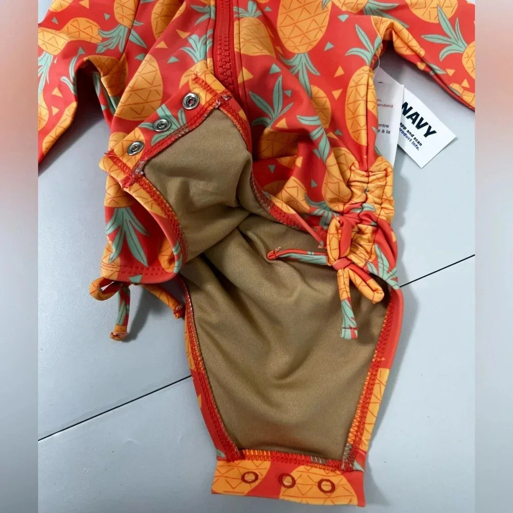- OLD NAVY BABY SWIMSUIT SIZE 0-3M